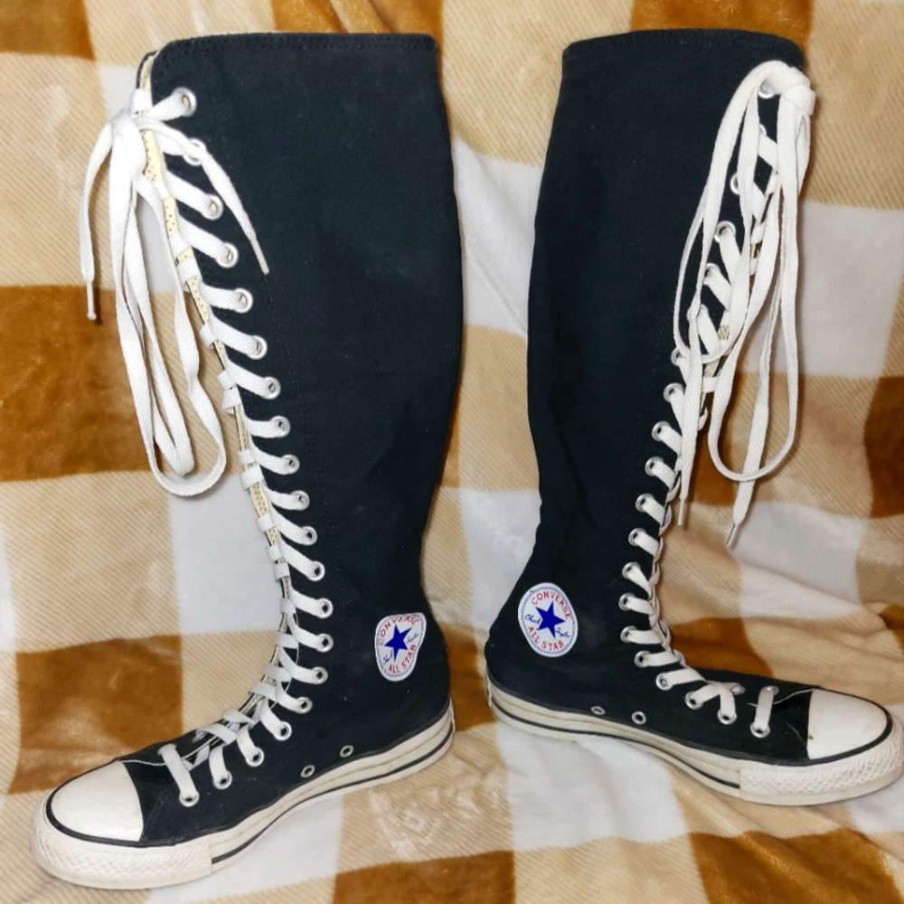 Knee high Black converse size 7 women's  , size 5 men's.